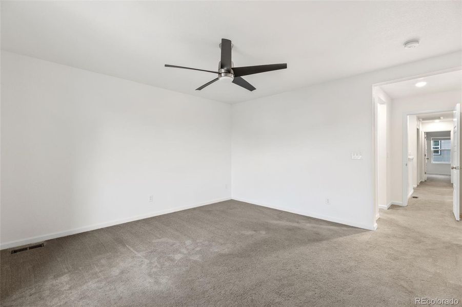 Spacious, unfurnished interior of a new home in The Aurora Highlands Horizon Collection, Aurora (Image 26).