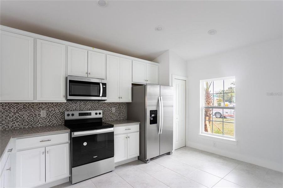 Furnished interior view inside a new home in , Port Charlotte (Image 9).