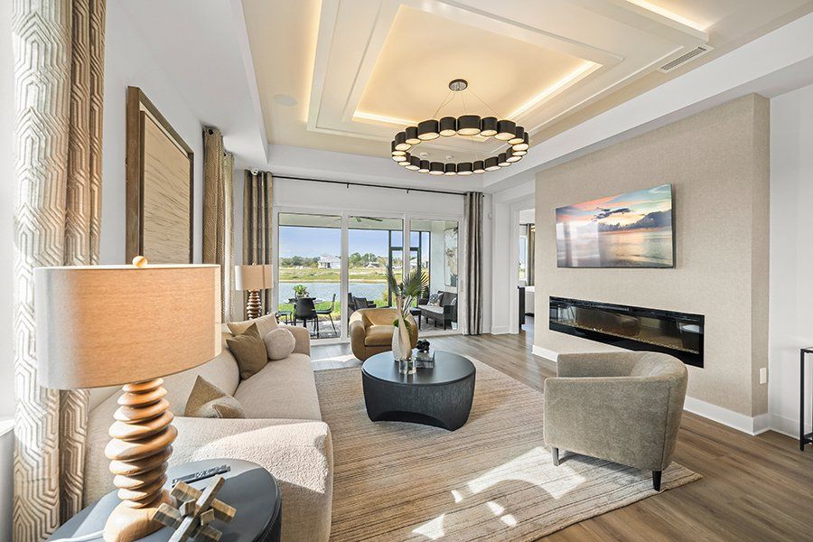 Representative furnished interior of a home built from the Regatta by Homes by Towne in Shellstone at Waterside, Sarasota (Image 10).