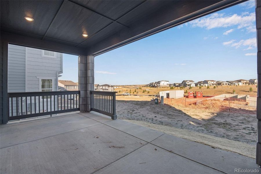 Exterior details and patio area of a home in Prelude at Sterling Ranch, Littleton (Image 32).