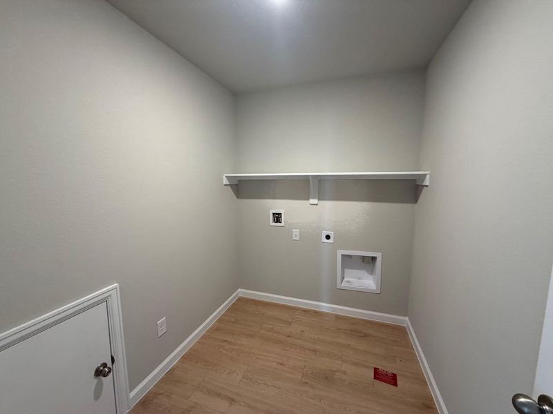 Spacious, unfurnished interior of a new home in Midtown Reserve, College Station (Image 9).