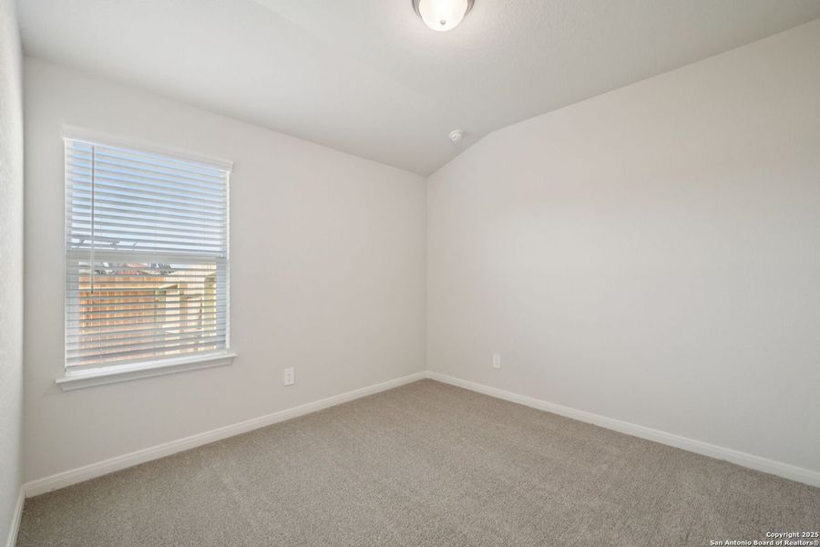 Spacious, unfurnished interior of a new home in Estancia Ranch - Premier Series, San Antonio (Image 16).