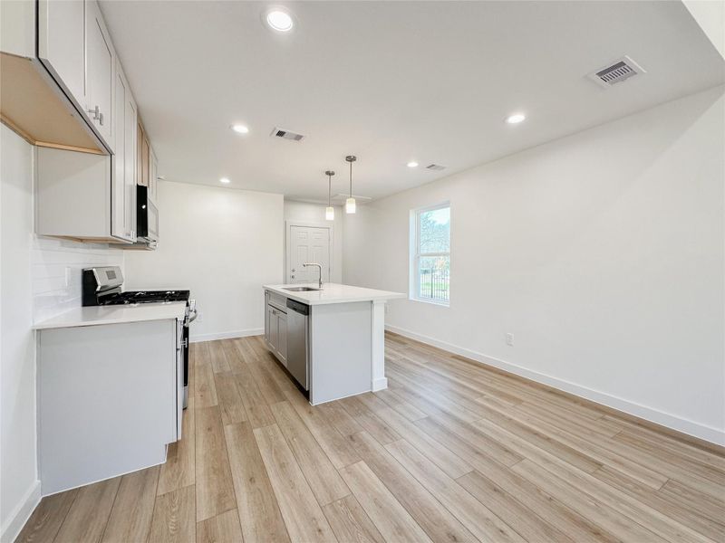 Furnished interior view inside a new home in , Conroe (Image 6).