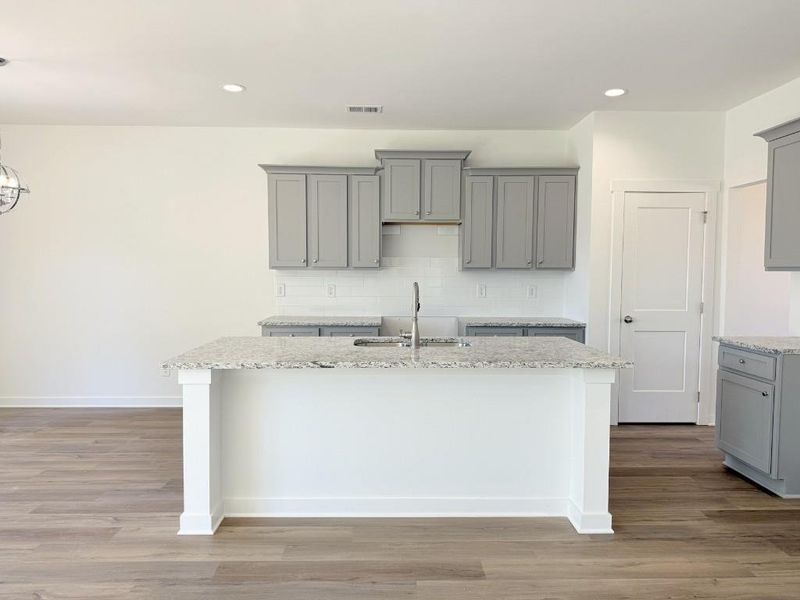 Furnished interior view inside a new home in Sutton's Landing, Statham (Image 10).