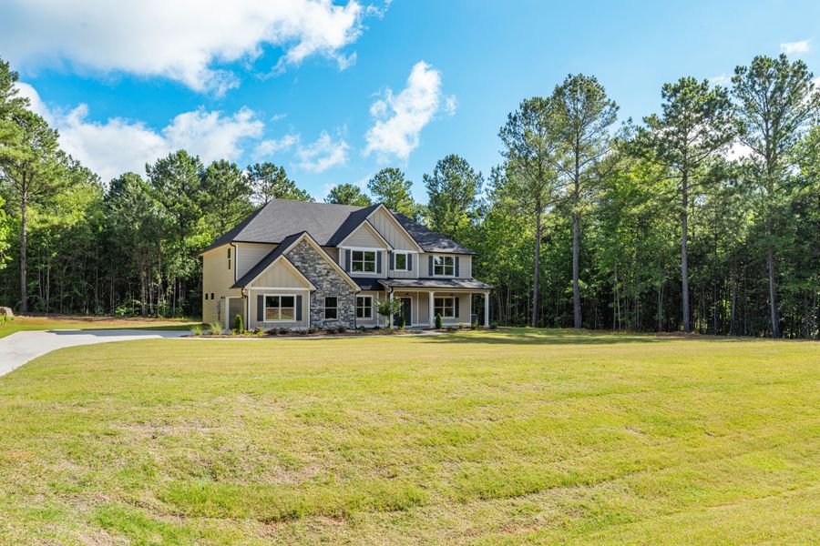 Front exterior of a new home in Flint Farms, Concord, GA, highlighting curb appeal (Image 24).