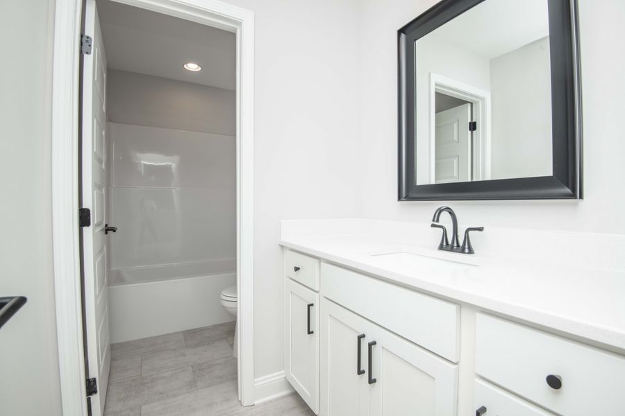 Furnished interior view inside a new home in Ivey Farms - The Grove Collection, Farragut (Image 16). Furnished interior view inside a new home in Ivey Farms - The Grove Collection, Farragut (Image 16).