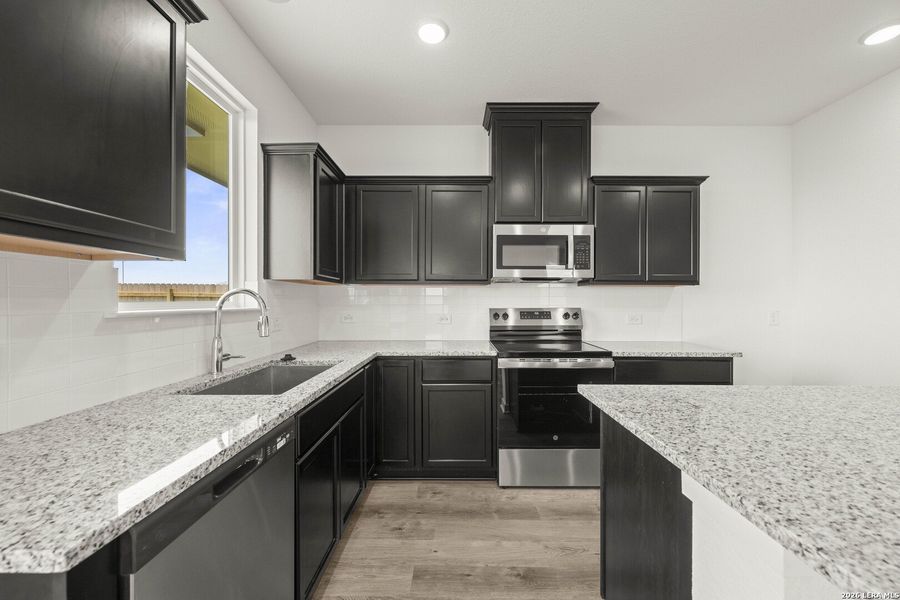 Furnished interior view inside a new home in Arroyo Ranch, Seguin (Image 4).