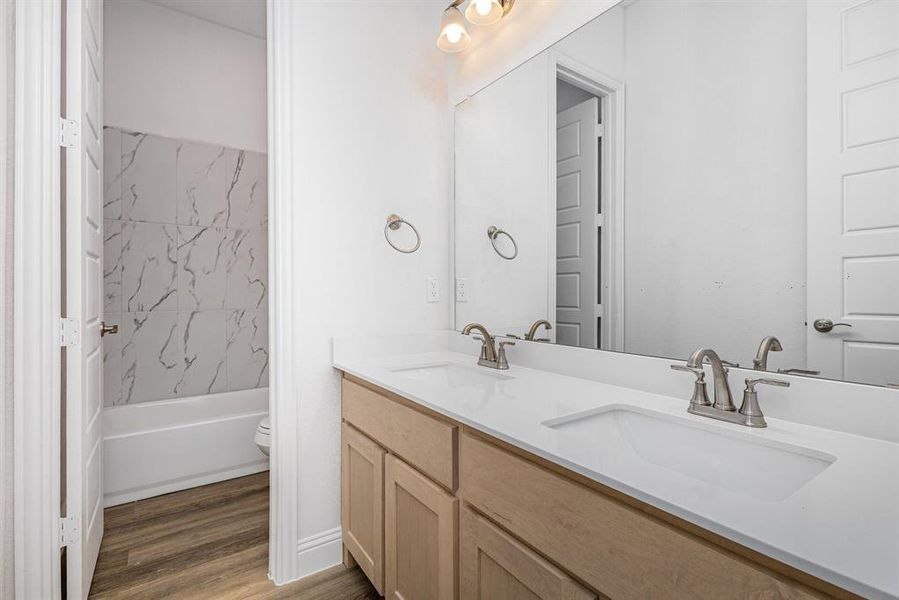 Furnished interior view inside a new home in Stone Henge II, Sanger (Image 6).