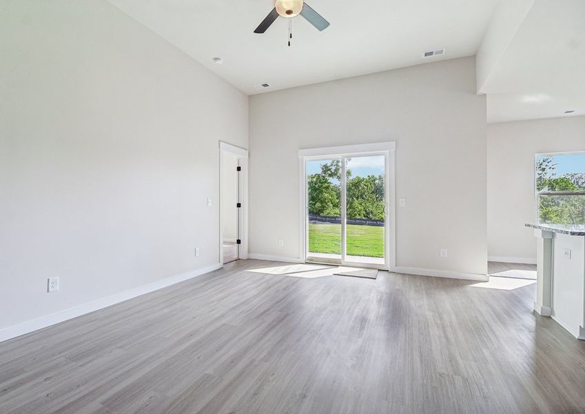 The living room opens to the backyard