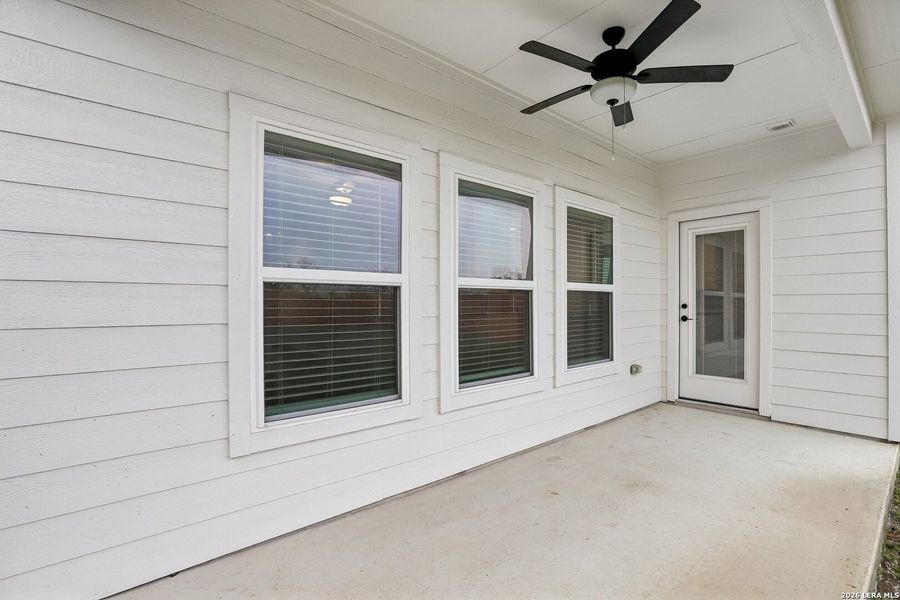 Exterior details and patio area of a home in Hightop Ridge, Converse (Image 23).