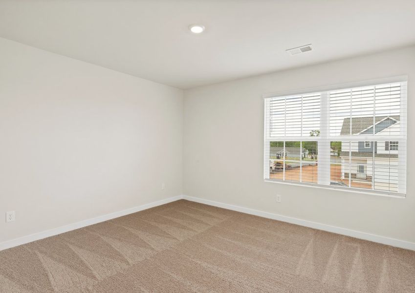 This home offers spacious bedrooms, each with their own closet.