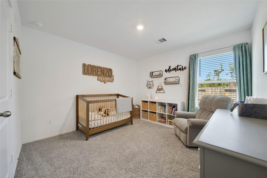 Furnished interior view inside a new home in The Canopies, Splendora (Image 27).