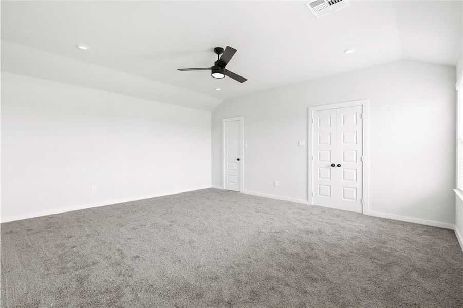 Primary retreat over 17x15 with walk in closet.