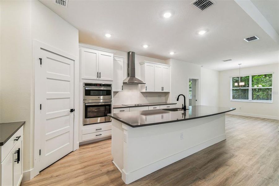 Furnished interior view inside a new home in Hidden Ridge, New Port Richey (Image 40).