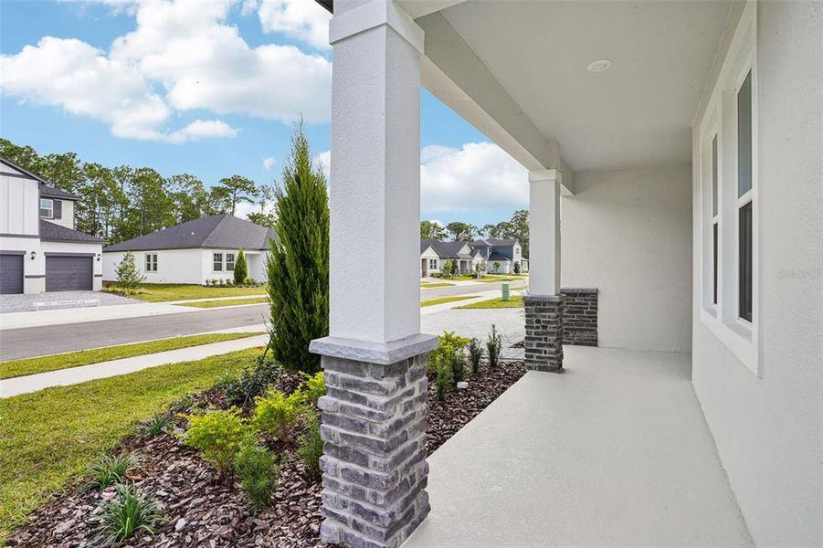 Exterior details and patio area of a home in , Ormond Beach (Image 27).