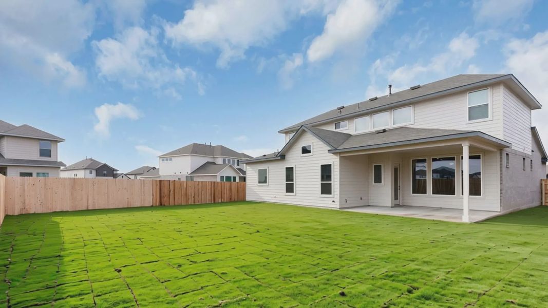 Exterior details and patio area of a home in The Grove at Blackhawk, Pflugerville (Image 3).