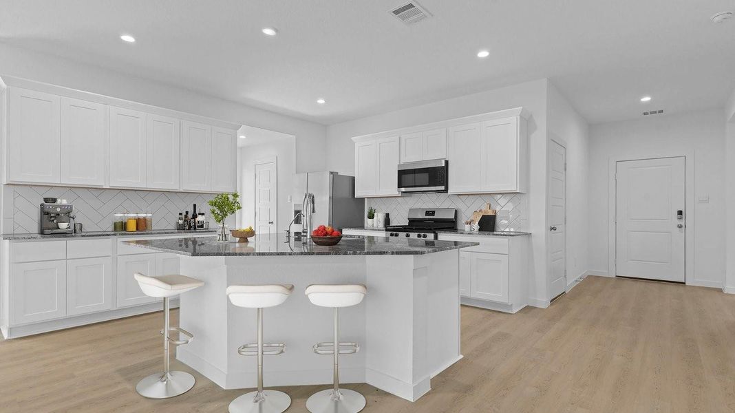 Furnished interior view inside a new home in Caldwell Crossing, Iowa Colony (Image 4).
