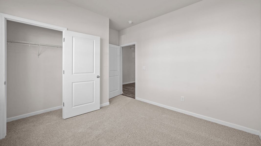 Spacious, unfurnished interior of a new home in Ridgewood Farms, Winterville (Image 17).