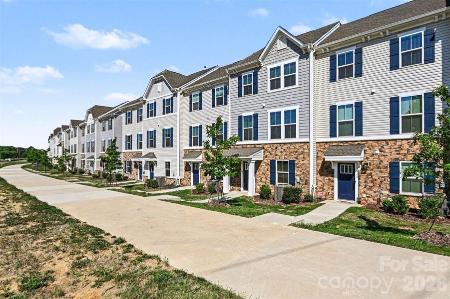 Front exterior of a new home in , Charlotte, NC, highlighting curb appeal (Image 25). Front exterior of a new home in , Charlotte, NC, highlighting curb appeal (Image 25).