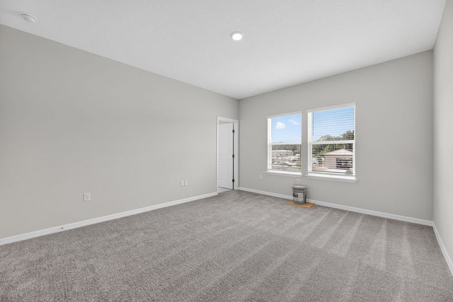 Representative unfurnished interior of a home built from the Bellflower by Taylor Morrison in Cherry Elm at SilverLeaf, St. Augustine (Image 23).