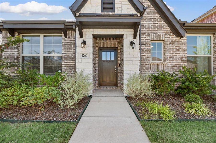 Front exterior of a new home in , Justin, TX, highlighting curb appeal (Image 24).