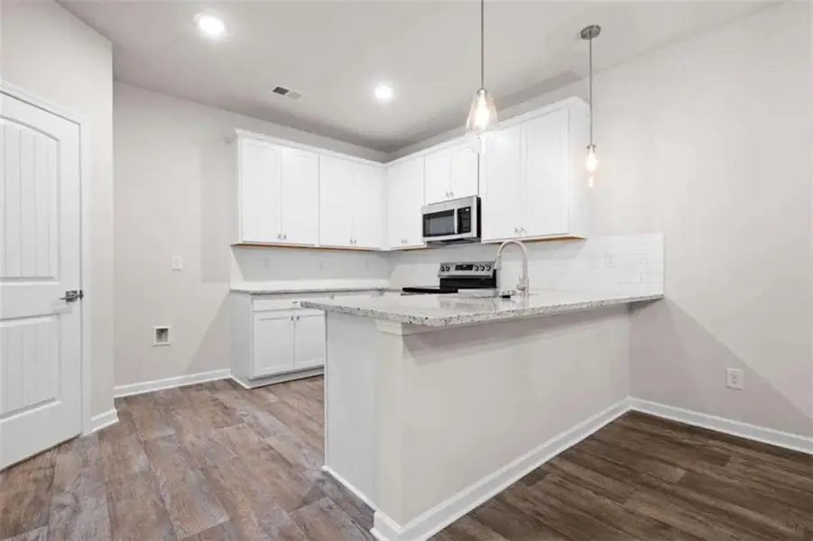 Furnished interior view inside a new home in Parkway James, Snellville (Image 3).