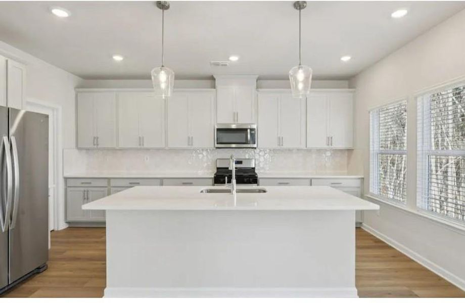 Furnished interior view inside a new home in Harmony Manor, Fairburn (Image 3).