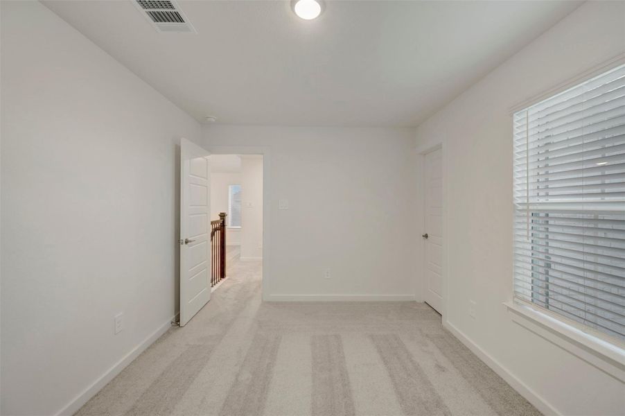 Spacious, unfurnished interior of a new home in Lone Star Landing, Montgomery (Image 38).