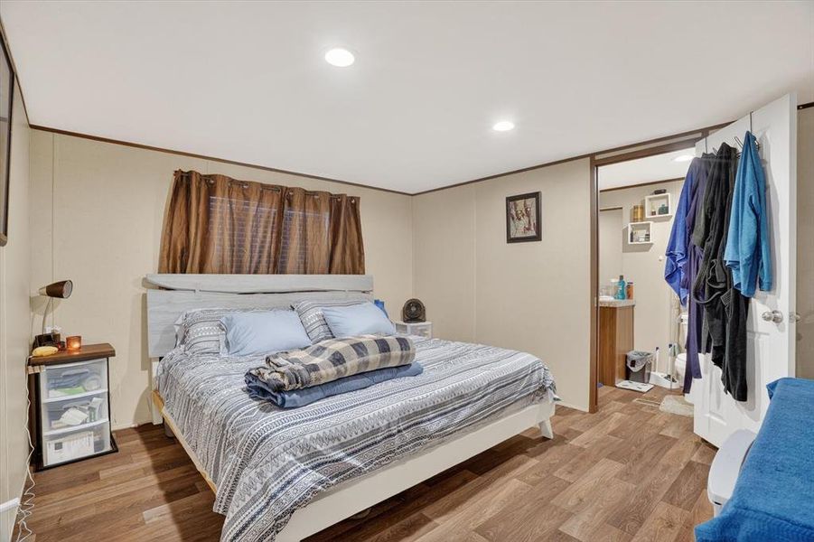 primary bedroom with private bathroom primary bedroom with private bathroom