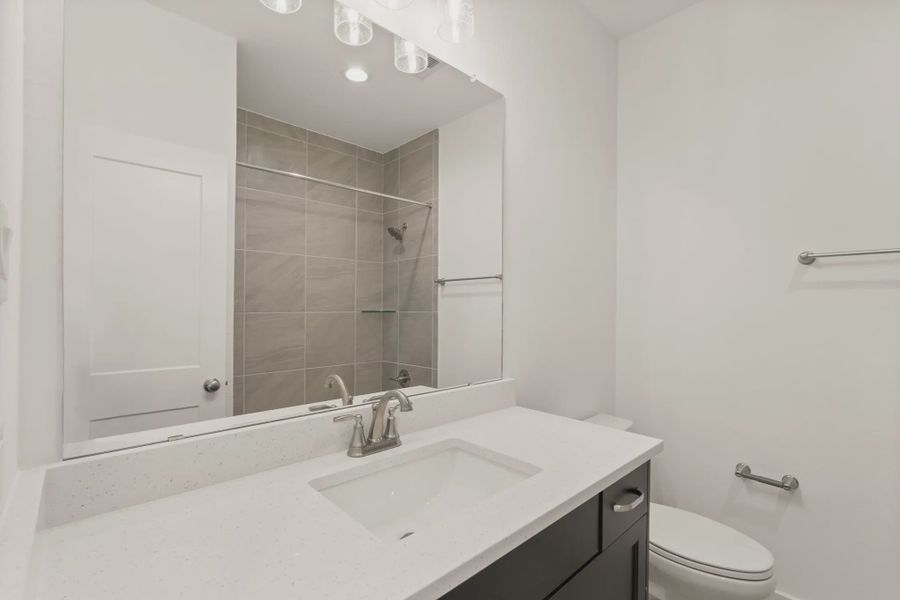 Representative furnished interior of a home built from the St Andrews by Chesmar Homes in Riceland Alley Loads, Mont Belvieu (Image 19).