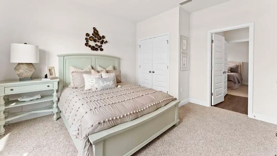 Representative furnished interior of a home built from the The Camden by D.R. Horton in Liberty, Panama City (Image 6).