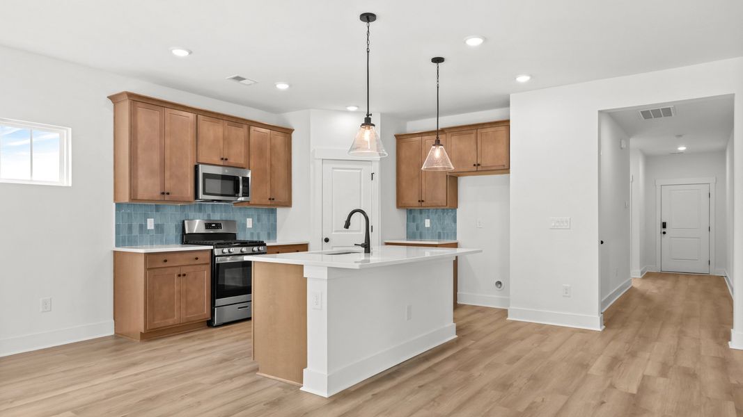 Furnished interior view inside a new home in Bluffs at Sun Colony, Longs (Image 6).
