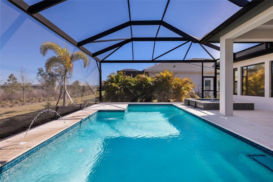 Exterior details and patio area of a home in Wild Blue at Waterside, Sarasota (Image 39). Exterior details and patio area of a home in Wild Blue at Waterside, Sarasota (Image 39).