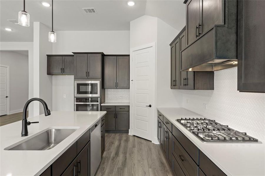 Furnished interior view inside a new home in Inspiration Collection 60 at Painted Tree, McKinney (Image 8). Furnished interior view inside a new home in Inspiration Collection 60 at Painted Tree, McKinney (Image 8).