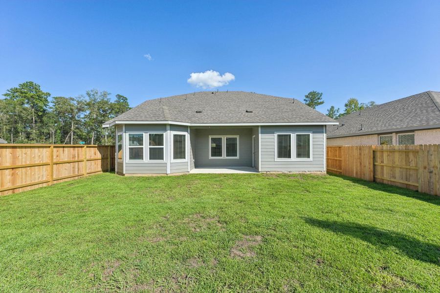 Front exterior of a new home in , New Caney, TX, highlighting curb appeal (Image 2). Front exterior of a new home in , New Caney, TX, highlighting curb appeal (Image 2).