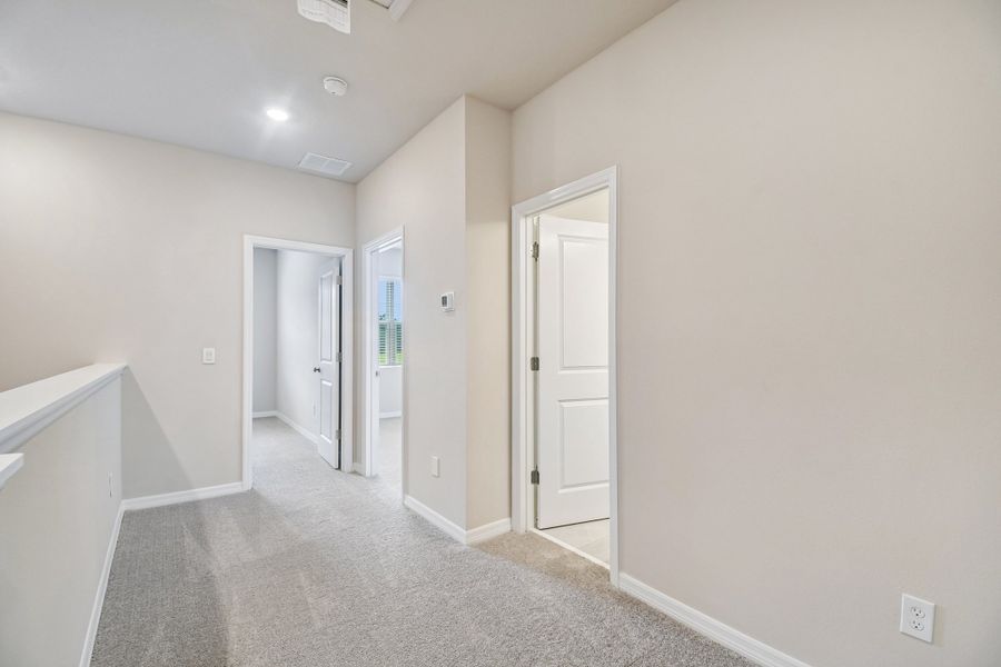 Spacious, unfurnished interior of a new home in Preserve at The Cays – The Harbor Series, Daytona Beach (Image 16). Spacious, unfurnished interior of a new home in Preserve at The Cays – The Harbor Series, Daytona Beach (Image 16).