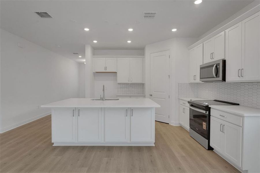 Furnished interior view inside a new home in Green Key Village, Lady Lake (Image 9). Furnished interior view inside a new home in Green Key Village, Lady Lake (Image 9).