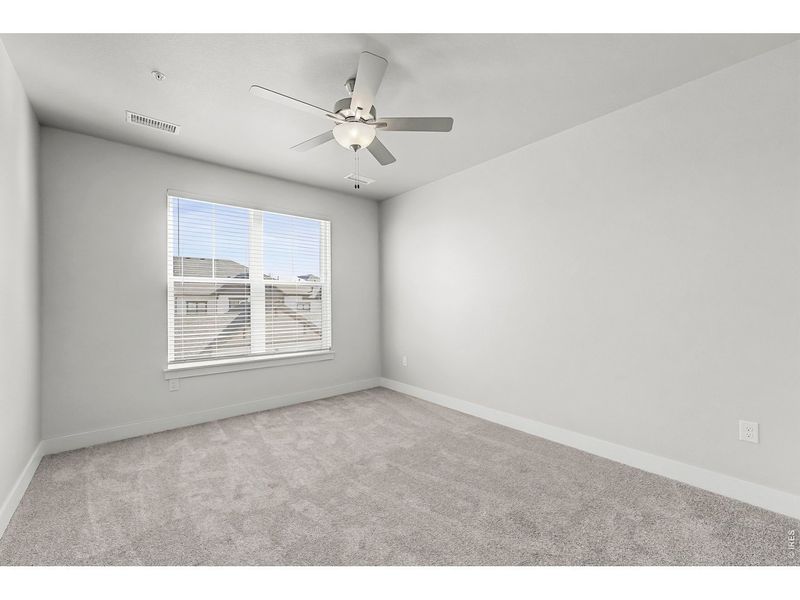 Spacious, unfurnished interior of a new home in Highlands at Fox Hill - The Flats, Longmont (Image 11).