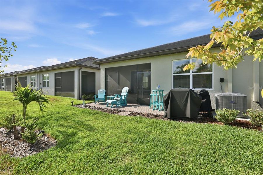 Exterior details and patio area of a home in Prosperity Lakes Active Adult, Parrish (Image 4).