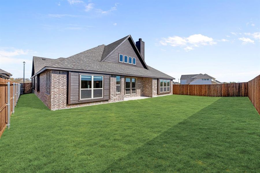 Exterior details and patio area of a home in Georgetown at Kings Fort 60s, Kaufman (Image 21).