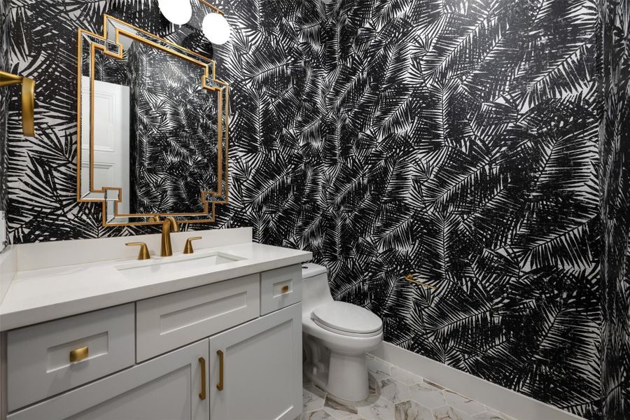 Bathroom with toilet and vanity