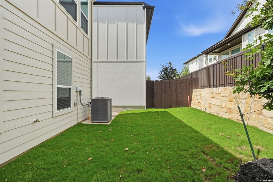 Exterior details and patio area of a home in Centero at Stone Oak, San Antonio (Image 28). Exterior details and patio area of a home in Centero at Stone Oak, San Antonio (Image 28).