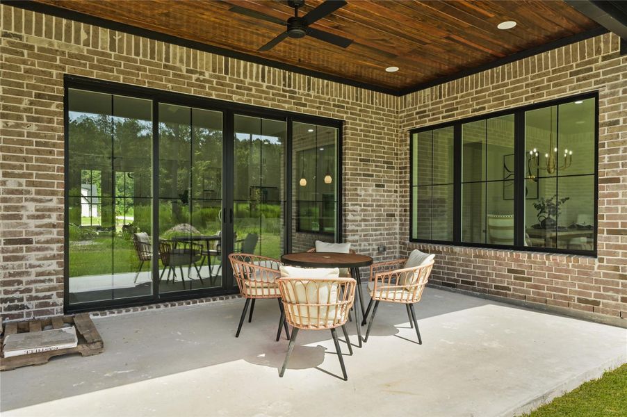 Exterior details and patio area of a home in , Conroe (Image 3). Exterior details and patio area of a home in , Conroe (Image 3).