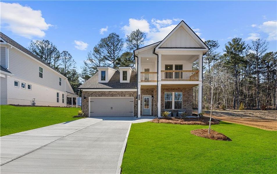 Front exterior of a new home in Hamilton Lakes, Lawrenceville, GA, highlighting curb appeal (Image 2). Front exterior of a new home in Hamilton Lakes, Lawrenceville, GA, highlighting curb appeal (Image 2).