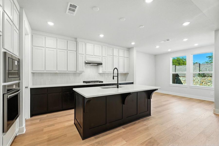 Furnished interior view inside a new home in COLTON: 50ft. lots, Todd Mission (Image 5).