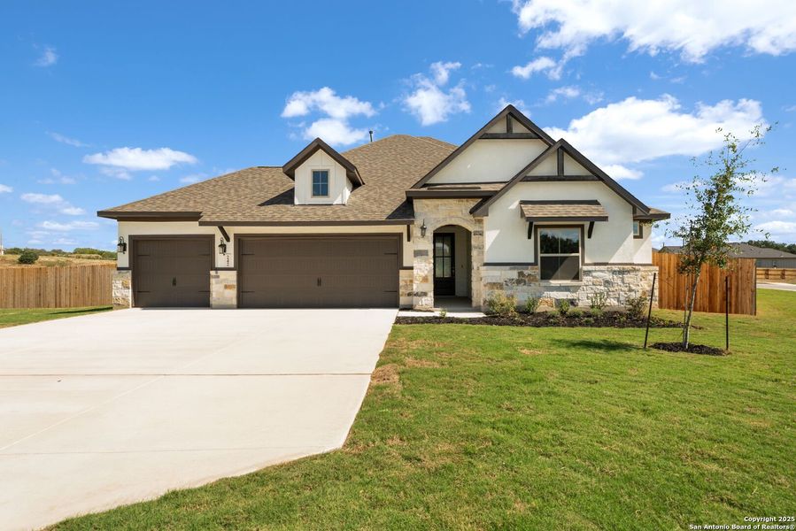 Front exterior of a new home in , Castroville, TX, highlighting curb appeal (Image 2).