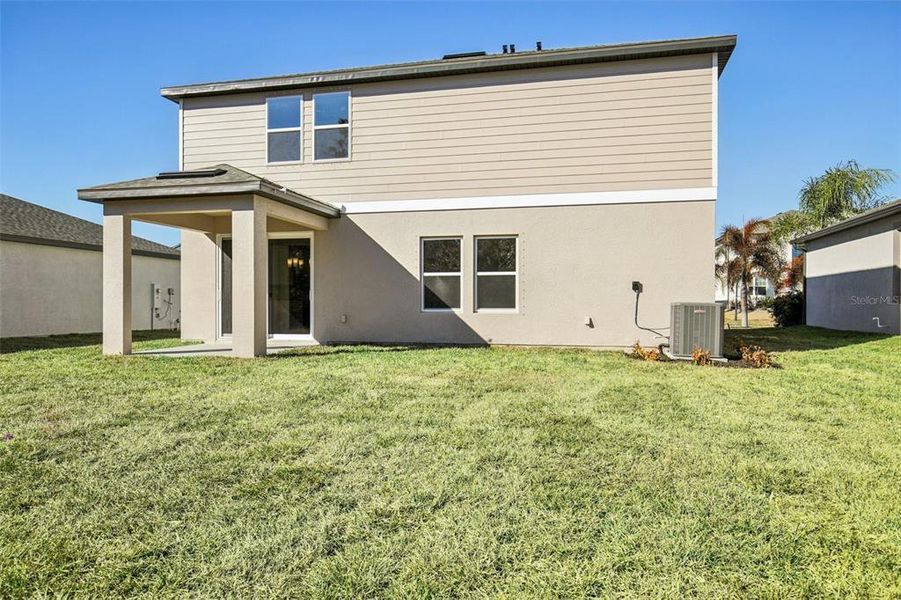 Exterior details and patio area of a home in Berry Bay, Wimauma (Image 3).