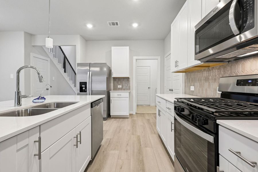 Photo is not of the actual home, but is an inspirational photo of builder’s model home and may depict options, furnishings, and/or decorator features that are not included