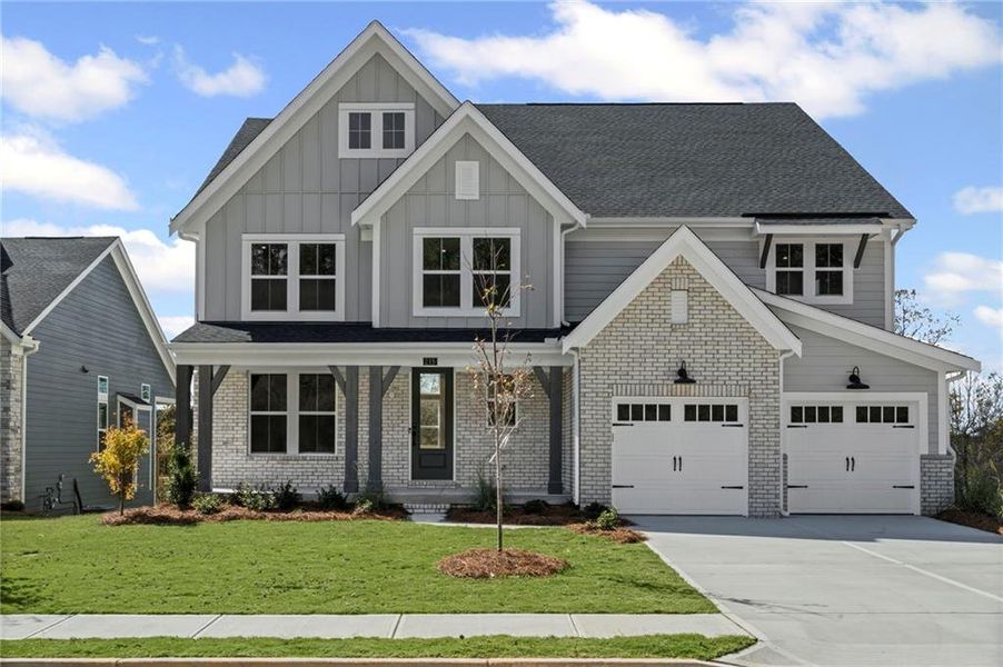 Front exterior of a new home in Twin Lakes, Hoschton, GA, highlighting curb appeal (Image 22).