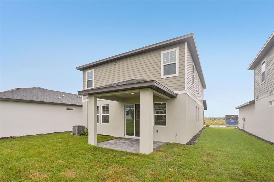 Exterior details and patio area of a home in Cyrene at Minneola, Minneola (Image 4).